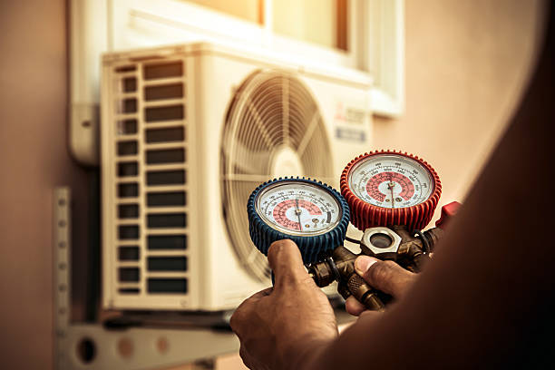 Professional Air Conditioning Service technician working in New Ringgold, PA